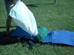 4. Put the clothing bag and sleeping bag stuff sacks inside a trash compactor bag to serve as a pack liner. 